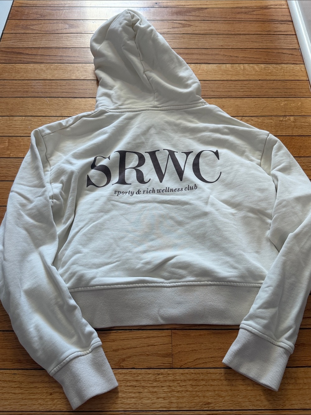 Sporty and Rich White Cropped Hoodie with Front Pocket